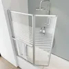 A shower screen attached to a bathtub in a bathroom. Produktbild-Vorschau