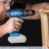 A person is using a cordless drill to drill into a piece of wood. Produktbild-Vorschau