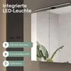 A bathroom mirror cabinet with integrated LED lighting, showcasing its features. Produktbild-Vorschau