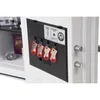 Close-up view of the interior of a safe, showing a key rack with four keys and some labels. Voir les images du produit