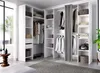A modern white wardrobe system with open shelves and hanging space, set in a bright room with a large window. Produktbild-Vorschau