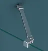 A close-up view of a shower enclosure hinge and glass panel against a teal background. Produktbild-Vorschau