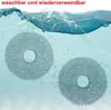 Two round mop pads submerged in water with the water splashing above them. Produktbild-Vorschau