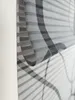 A close-up view of a gray and black striped fabric. Produktbild-Vorschau