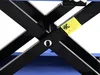 A close-up view of the scissor mechanism of a motorcycle lift, with a warning sticker visible. Náhľad obrázku produktu