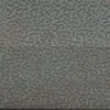 A close-up textured surface of a decorative garden fountain. Produktbild-Vorschau