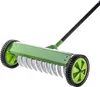 A green manual lawn aerator with black wheels and handle, shown against a white background. Produktbild-Vorschau