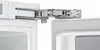 A close-up view of a refrigerator hinge mechanism. Produktbild-Vorschau
