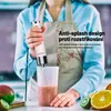 A person is using a stick blender to make a smoothie, with fruit on the counter. The image is split to show an anti-splash feature. Náhled obrázku produktu