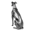 A silver-colored dog figurine is shown from a side-back view, sitting on a white background. Náhled obrázku produktu