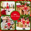Weihnachtswichtel-Mädchen in verschiedenen Adventsszenen mit Weihnachtsbaum und Festtafel sowie den Maßen 10 x 5 x 38 cm. Hinweis: KI generiertes Bild Voir les images du produit