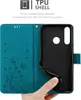 A hand is holding open a teal phone case, revealing the black TPU shell inside. Náhľad obrázku produktu