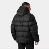 A man wearing a black puffer jacket, viewed from the back. Voir les images du produit