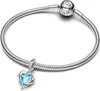 A silver Pandora bracelet with a blue heart-shaped charm featuring dolphins. Anteprima dell’immagine prodotto
