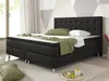 A black boxspring bed with a tufted headboard is shown in a bedroom setting. Produktbild-Vorschau