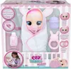 The image shows the packaging of a Cry Babies Newborn Coney interactive doll, along with some of its accessories and a child holding the doll. Anteprima dell’immagine prodotto