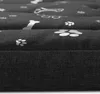A close-up view of a dark gray dog bed with a pattern of white paw prints and bones. Náhled obrázku produktu