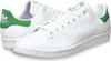 A pair of white Adidas Stan Smith sneakers with green accents. Náhled obrázku produktu