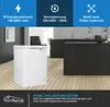 A white chest freezer is shown in a modern kitchen setting with black cabinets. Produktbild-Vorschau