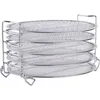 A stack of five round metal mesh pizza pans on a metal rack. Produktbild-Vorschau