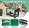 Children playing with a multi-game table in a living room. Anteprima dell’immagine prodotto