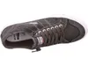 A single green sneaker is shown from a top-down diagonal angle against a white background. Voir les images du produit