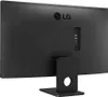 The back of a black LG monitor is shown, mounted on its stand. Produktbild-Vorschau