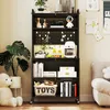 A black shelving unit filled with various decorative items, books, and toys, placed in a room with a large potted plant and a plush toy in the foreground. Produktbild-Vorschau
