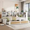 A bedroom scene featuring a white daybed with a pull-out trundle, integrated shelving unit, and decorative items. Voir les images du produit
