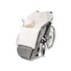 A wheelchair with a furry liner is shown against a white background. Produktbild-Vorschau