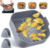 A collage of images showing a gray silicone air fryer liner with potato chips, a whole roasted chicken, potatoes, and a piece of meat with vegetables. Two gray silicone oven mitts are also shown. Produktbild-Vorschau