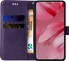 A purple flip cover phone case with card slots and a banknote is shown open, revealing a smartphone screen with a pink abstract wallpaper. Produktbild-Vorschau