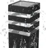 A black and clear outdoor lamp with water droplets on it. Náhľad obrázku produktu