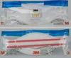 Two packaged face masks are shown, one above the other. Anteprima dell’immagine prodotto