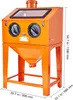 An orange sandblasting cabinet on a white background with dimensions indicated. Voir les images du produit