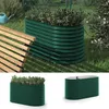 A green metal raised garden bed filled with plants, situated on a lawn next to a wooden bench. The image also includes two smaller views of the garden bed on a white background. Voir les images du produit