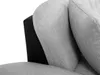 A close-up view of a sofa's corner, showing the texture of the fabric and the contrast with a black side panel. Náhľad obrázku produktu