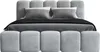 A modern upholstered bed with a padded headboard and a row of upholstered ottomans at the foot of the bed. Produktbild-Vorschau
