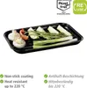 A black grilling tray filled with various vegetables and herbs, presented on a white background. Produktbild-Vorschau