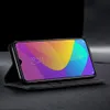 A smartphone in a black flip case is displayed on a dark surface. Produktbild-Vorschau
