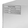 A close-up of a label on a stainless steel appliance, likely a vacuum tumbler, showing its specifications. Podgląd zdjęcia produktu