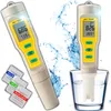 Two digital pH meters are shown, one in use in a glass of water, with packets of calibration solution nearby. Water splashes are depicted in the background. Voir les images du produit