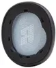 A close-up view of a black headphone earpad with a light gray mesh interior. Náhled obrázku produktu