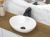 A modern bathroom sink with a black waterfall faucet. Náhled obrázku produktu