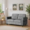 A living room scene with a sofa, side table, and plants. Produktbild-Vorschau