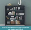 A dark gray storage cabinet with multiple shelves, filled with books, decorative items, and storage boxes. The cabinet doors are open, revealing the contents. A teal overlay at the bottom displays text in German. Produktbild-Vorschau