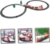 A collage of images showing a toy Christmas train set with tracks and festive decorations. Náhľad obrázku produktu