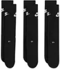 Three pairs of black Nike crew socks are neatly arranged side-by-side against a white background. Produktbild-Vorschau