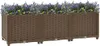 A brown woven planter box filled with purple and yellow flowers, set against a white background. Náhled obrázku produktu