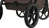 Close-up of the wheels and frame of a stroller. Náhled obrázku produktu